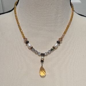 Vintage Elegant Beaded Necklace with Amber and Silver Accents
